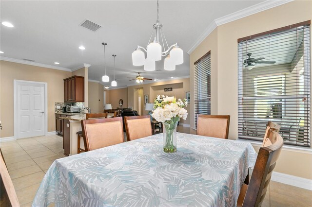 dining room with recessed lighting, visible vents, ornamental molding, and ceiling fan with notable chandelier