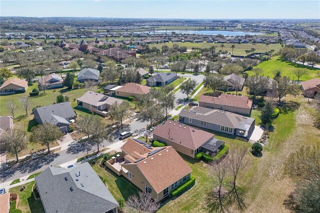 aerial view with a residential view and a water view