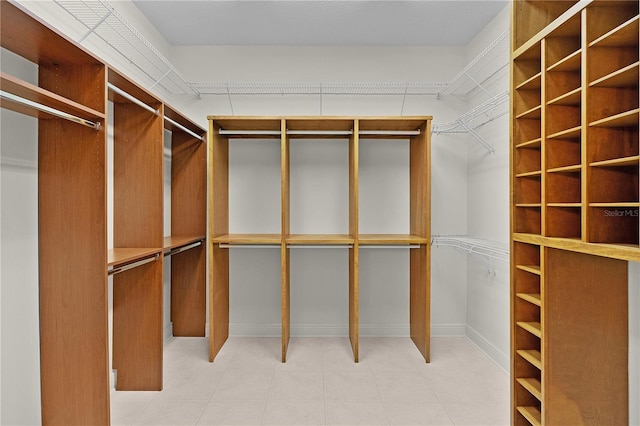 1721 Sunset Ridge Dr, The Villages, FL 32162 - spacious closet featuring tile patterned floors
