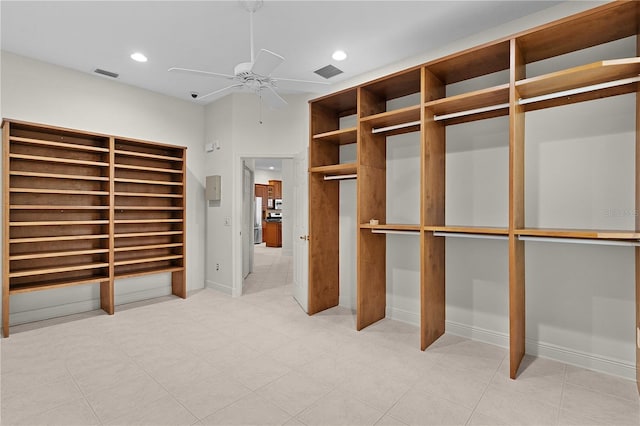 1721 Sunset Ridge Dr, The Villages, FL 32162 - unfurnished bedroom with freestanding refrigerator, recessed lighting, baseboards, ceiling fan, and light tile patterned flooring