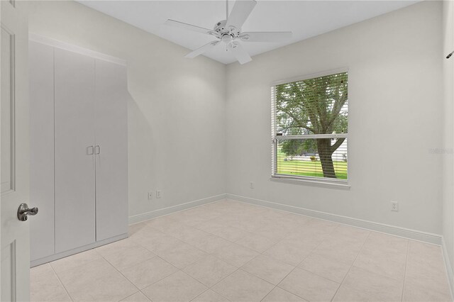 1721 Sunset Ridge Dr, The Villages, FL 32162 - spare room with a ceiling fan and baseboards