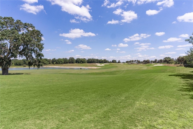 1721 Sunset Ridge Dr, The Villages, FL 32162 - view of home's community with view of golf course, a lawn, and a water view