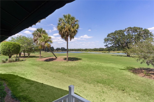 1721 Sunset Ridge Dr, The Villages, FL 32162 - view of grassy yard featuring a water view