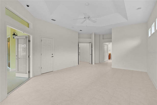 1721 Sunset Ridge Dr, The Villages, FL 32162 - spare room with a ceiling fan and light tile patterned flooring