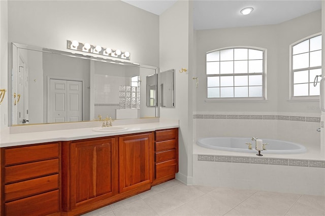 1721 Sunset Ridge Dr, The Villages, FL 32162 - bathroom with a bath, vanity, and tile patterned flooring