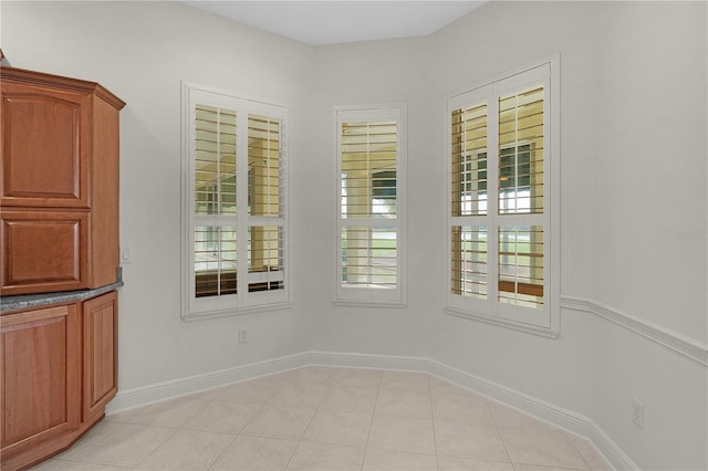 1721 Sunset Ridge Dr, The Villages, FL 32162 - unfurnished dining area with baseboards