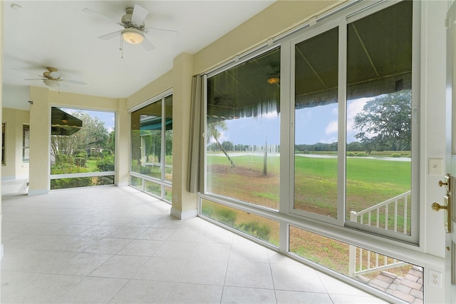 1721 Sunset Ridge Dr, The Villages, FL 32162 - unfurnished sunroom with ceiling fan