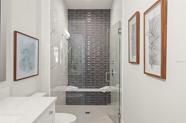 full bath with toilet, a shower stall, and vanity