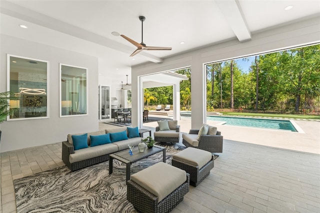 view of patio / terrace featuring an outdoor pool, a ceiling fan, and an outdoor living space