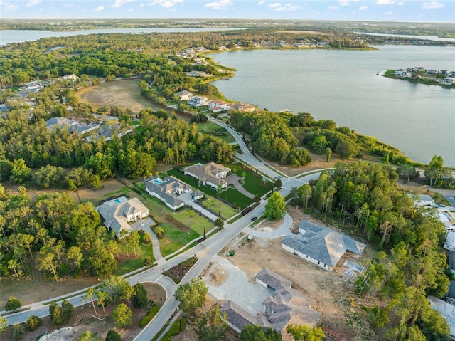 aerial view with a water view and a residential view