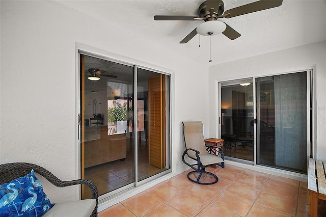 view of patio / terrace featuring a ceiling fan