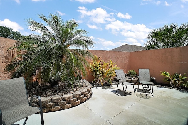 view of patio with fence