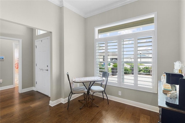 dining room featuring baseboards, dark wood-style floors, and ornamental molding