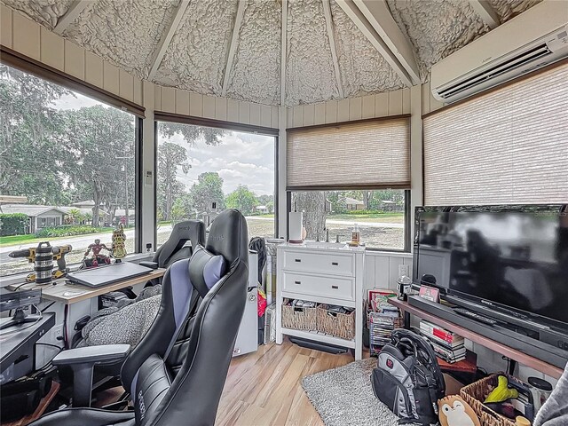 1001 N Lakeshore Blvd, Howey In The Hills, FL 34737 - home office featuring light wood-type flooring and a wall unit AC