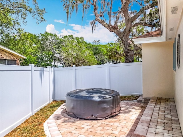 1001 N Lakeshore Blvd, Howey In The Hills, FL 34737 - view of patio / terrace with a fenced backyard