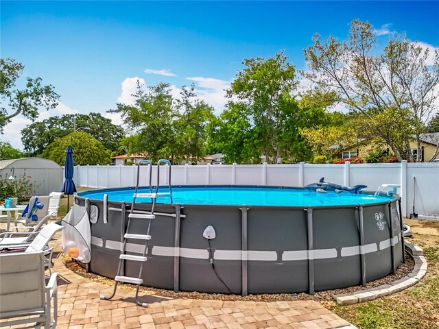 1001 N Lakeshore Blvd, Howey In The Hills, FL 34737 - view of pool with fence and a fenced in pool