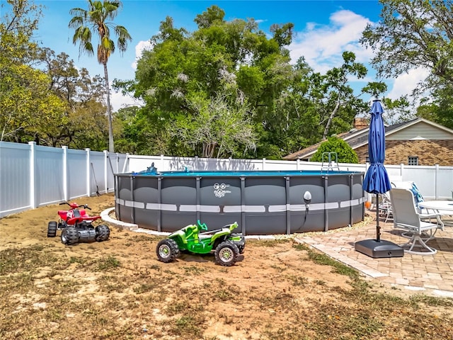 1001 N Lakeshore Blvd, Howey In The Hills, FL 34737 - view of pool with a fenced in pool and a fenced backyard