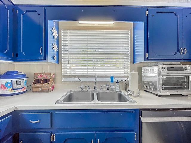 1001 N Lakeshore Blvd, Howey In The Hills, FL 34737 - laundry room featuring cabinet space, a toaster, and a sink