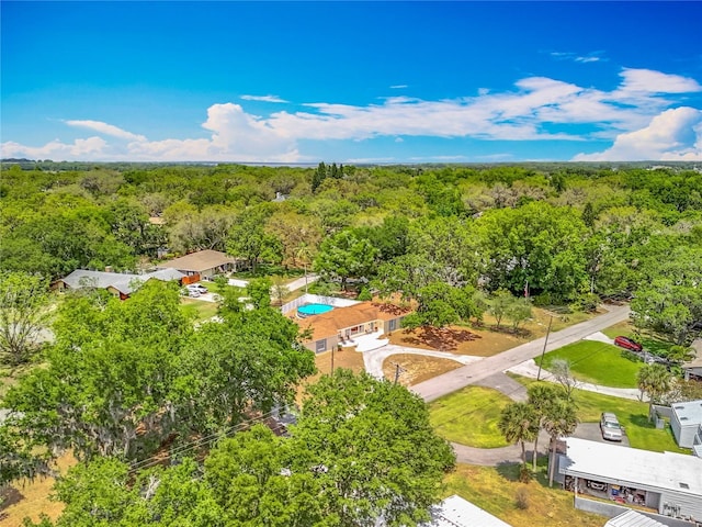 1001 N Lakeshore Blvd, Howey In The Hills, FL 34737 - birds eye view of property featuring a forest view