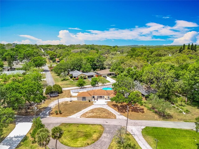 1001 N Lakeshore Blvd, Howey In The Hills, FL 34737 - bird's eye view featuring a forest view
