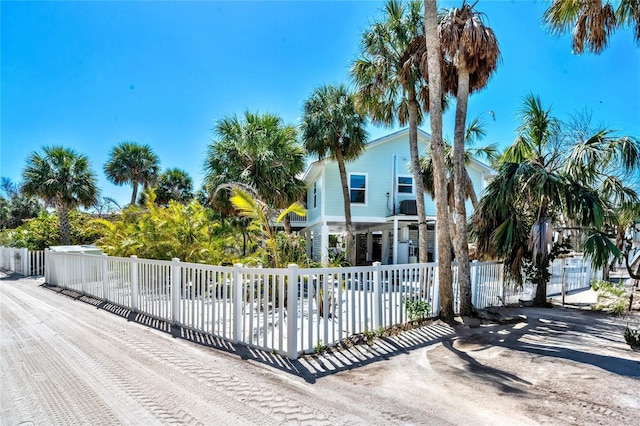 exterior space with a fenced front yard