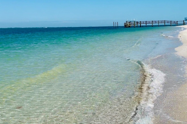view of water feature with a beach view