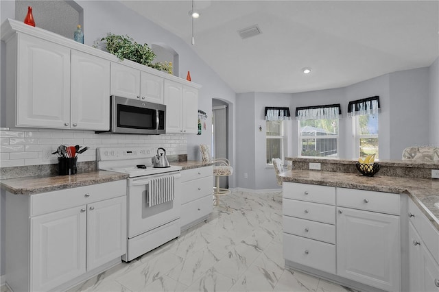 kitchen featuring white range with electric cooktop, marble finish floor, stainless steel microwave, lofted ceiling, and visible vents