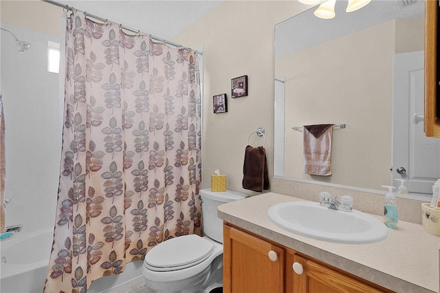 full bath with toilet, shower / bath combination with curtain, and vanity