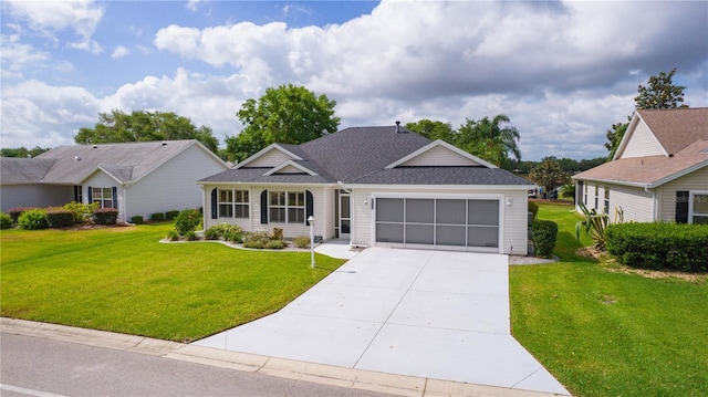 ranch-style home with an attached garage, driveway, roof with shingles, and a front lawn