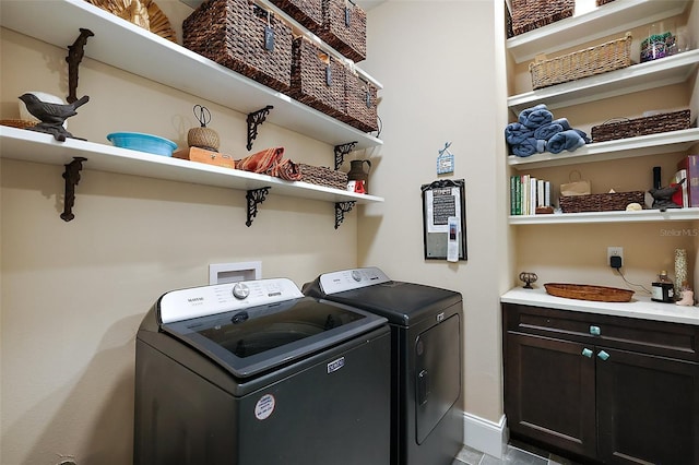 6905 Clayton St, Mount Dora, FL 32757 - clothes washing area with washer and clothes dryer, baseboards, and cabinet space