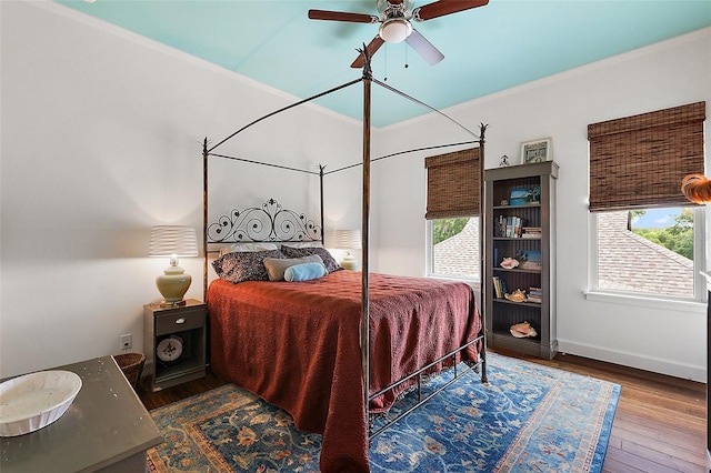 6905 Clayton St, Mount Dora, FL 32757 - bedroom featuring multiple windows, wood finished floors, and baseboards