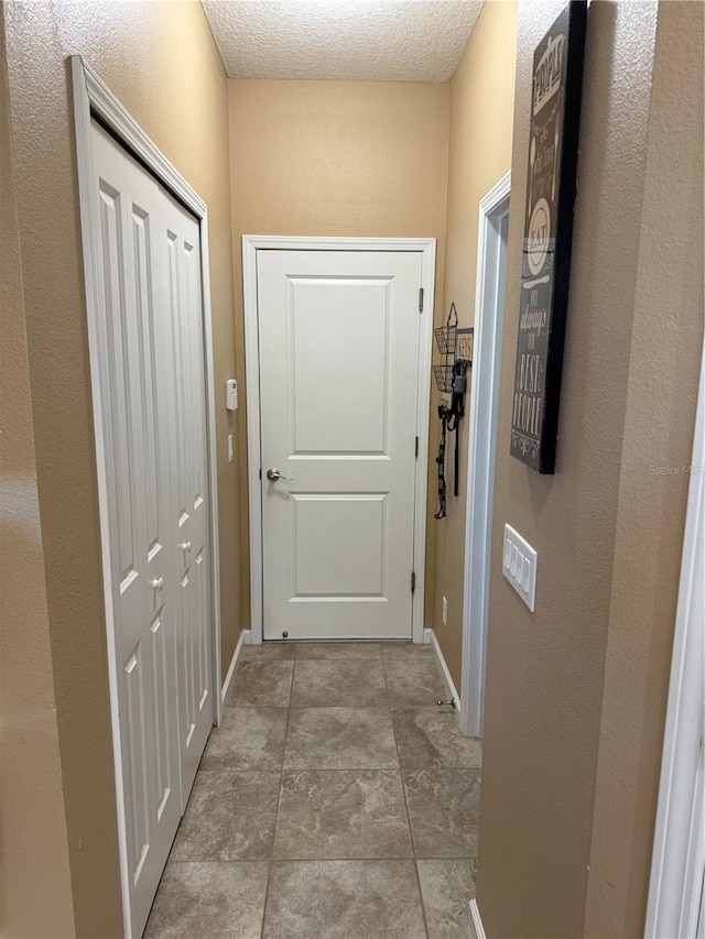 doorway with baseboards