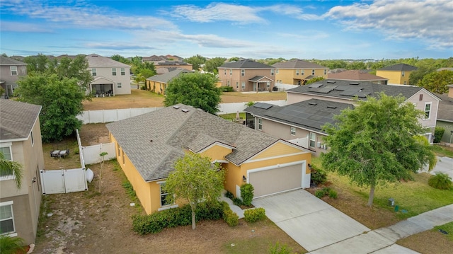 birds eye view of property with a residential view