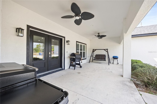 view of patio with a ceiling fan and french doors