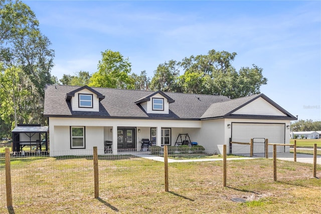 view of front of home featuring a garage, fence, a front yard, and concrete driveway