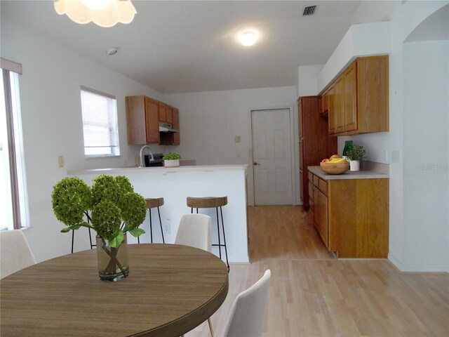 739 Cortez Ave, The Villages, FL 32159 - dining space featuring light wood finished floors
