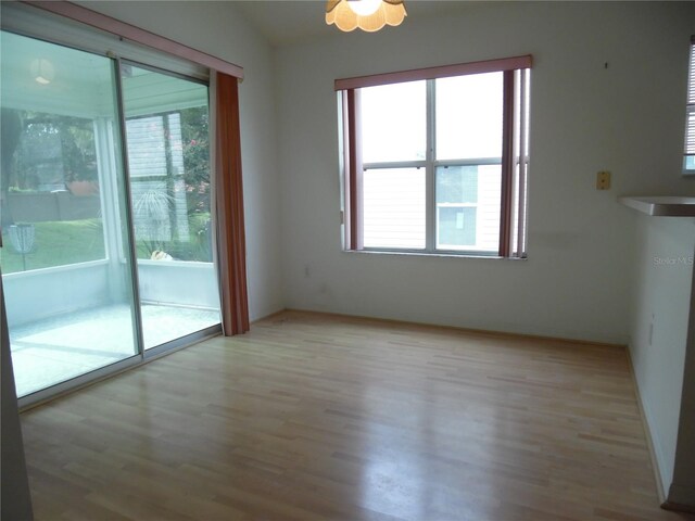739 Cortez Ave, The Villages, FL 32159 - empty room with light wood finished floors