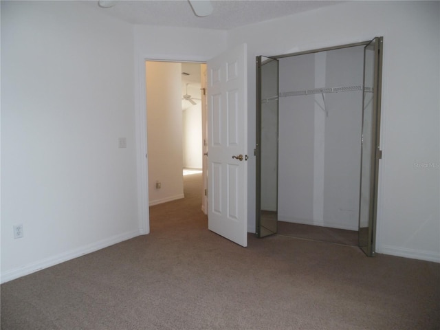 739 Cortez Ave, The Villages, FL 32159 - unfurnished bedroom featuring carpet flooring and a closet