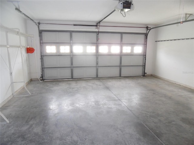 739 Cortez Ave, The Villages, FL 32159 - garage featuring a garage door opener