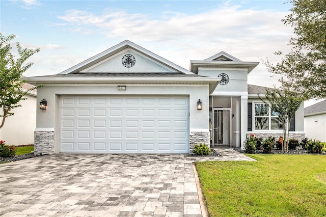 8492 Hartford Way, Mount Dora, FL 32757 - view of front of property with stucco siding, decorative driveway, stone siding, and a front lawn