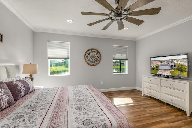 8492 Hartford Way, Mount Dora, FL 32757 - bedroom featuring wood finished floors, crown molding, recessed lighting, and a ceiling fan