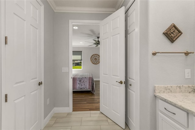 8492 Hartford Way, Mount Dora, FL 32757 - corridor with crown molding and light tile patterned floors