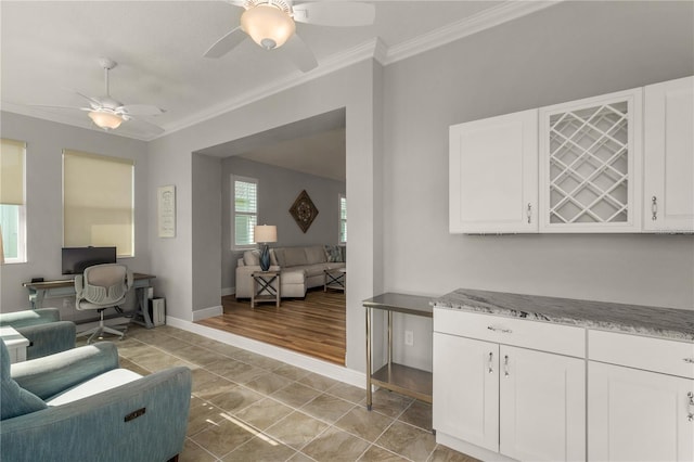 8492 Hartford Way, Mount Dora, FL 32757 - living room featuring a ceiling fan, crown molding, and a desk