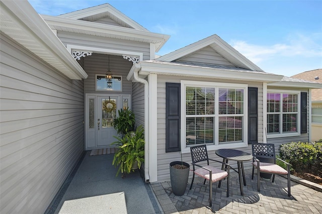 1140 Eureka Mill Run, The Villages, FL 32162 - view of exterior entry featuring a patio