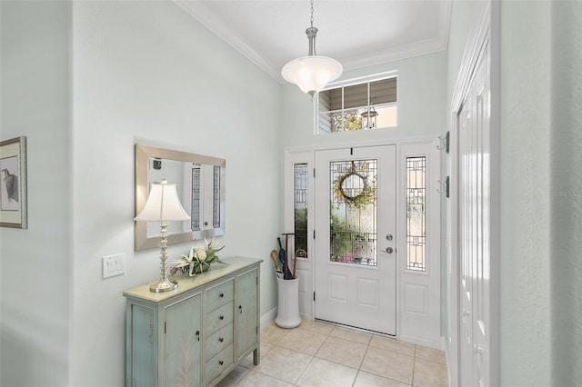1140 Eureka Mill Run, The Villages, FL 32162 - entrance foyer featuring baseboards, crown molding, light tile patterned flooring, and a towering ceiling