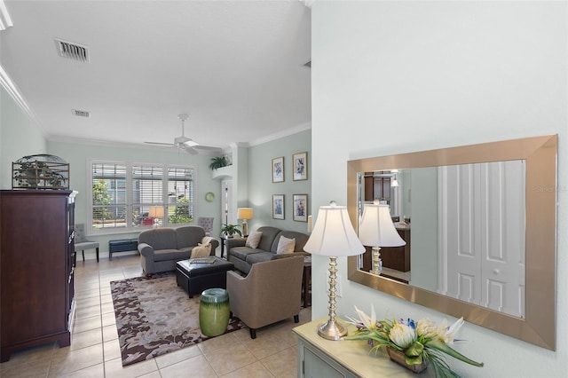 1140 Eureka Mill Run, The Villages, FL 32162 - living room with ceiling fan, visible vents, light tile patterned flooring, and ornamental molding