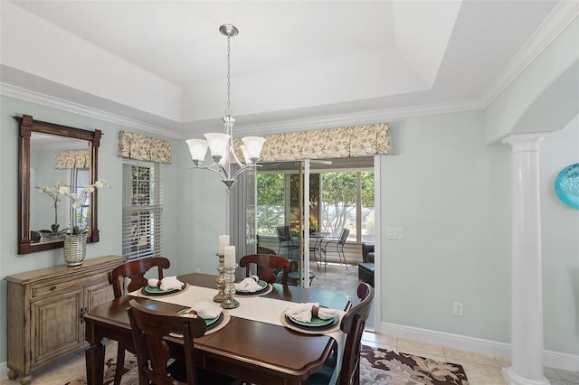 1140 Eureka Mill Run, The Villages, FL 32162 - dining room with a tray ceiling, baseboards, a chandelier, and decorative columns