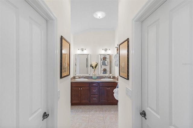 1140 Eureka Mill Run, The Villages, FL 32162 - bathroom featuring ornamental molding, tile patterned floors, double vanity, and a sink