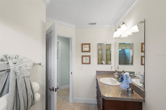 1140 Eureka Mill Run, The Villages, FL 32162 - bathroom featuring tile patterned floors, crown molding, visible vents, baseboards, and vanity