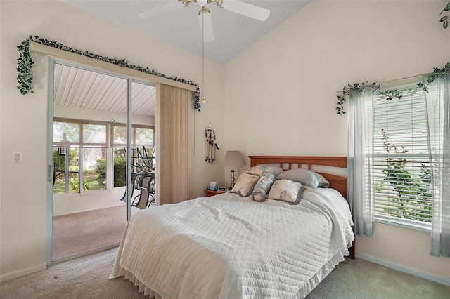 carpeted bedroom featuring a ceiling fan, vaulted ceiling, and baseboards